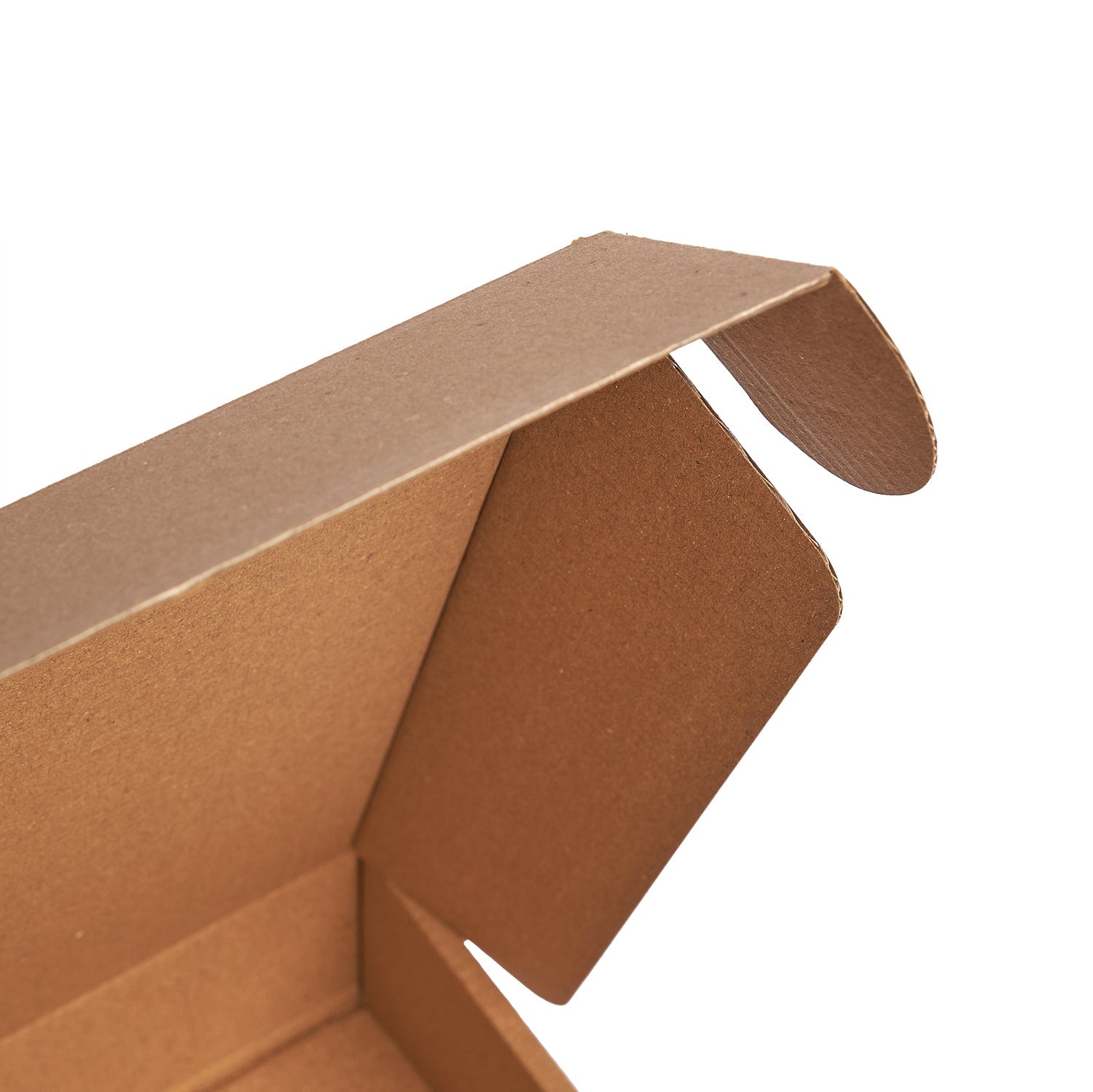 Close-up of a brown cardboard box on a white background